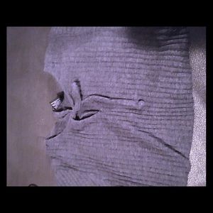 All grey shirt with a bow in the front